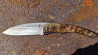 Couteau Berzerker Camouflage et sa lame XC75