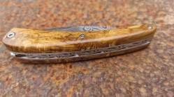 Couteau de collection Toltek en damas Œil d'Odin et son manche en loupe de myrthe Ardèchoise