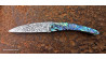 Couteau de collection Toltek manche en nacre abalone et manche en damas aléatoire