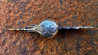 Korbak couteau crâne de corbeau viking en fonte de bronze casque en argent et sa lame damas