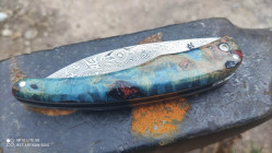 Couteau unique gamme Berzerker collection damas manche hybride en peuplier stabilisé & résine